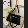 Elegancka czarna torebka z eko zamszu z klapką